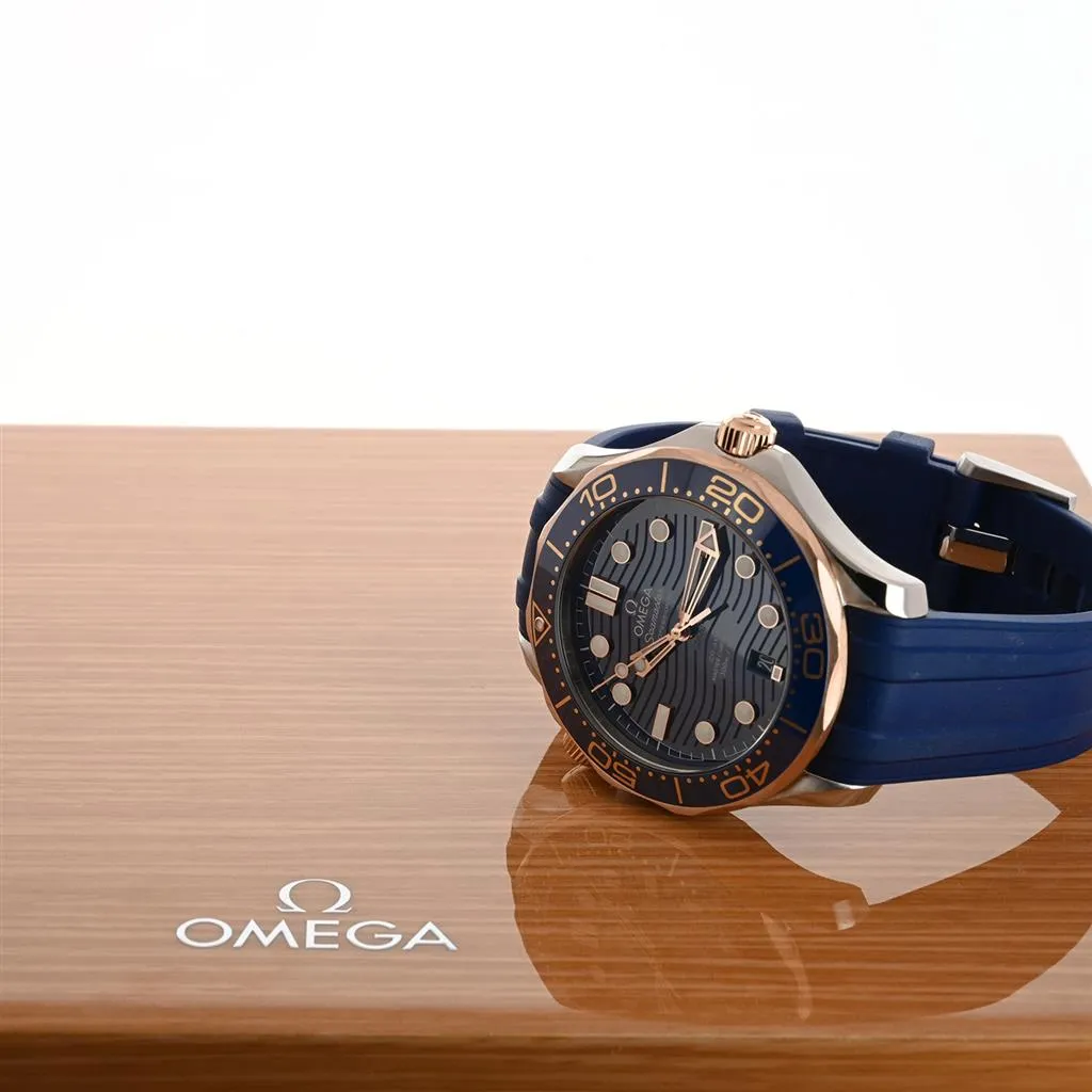 Omega | 42mm, Seamaster 300m Co-Axial Master Chronometer, Blue Ceramic Bezel, Ceragold -210.22.42.20.03.002